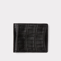 Black leather wallet with crocodile texture on a light gray background
