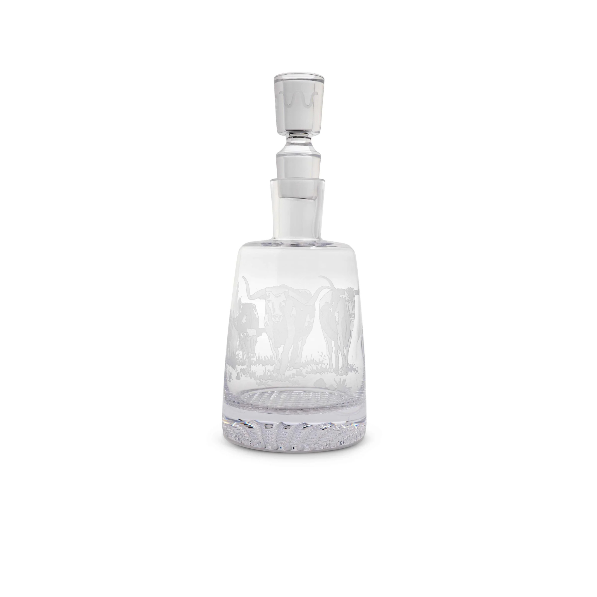 Clear glass decanter with silver stopper on a white background